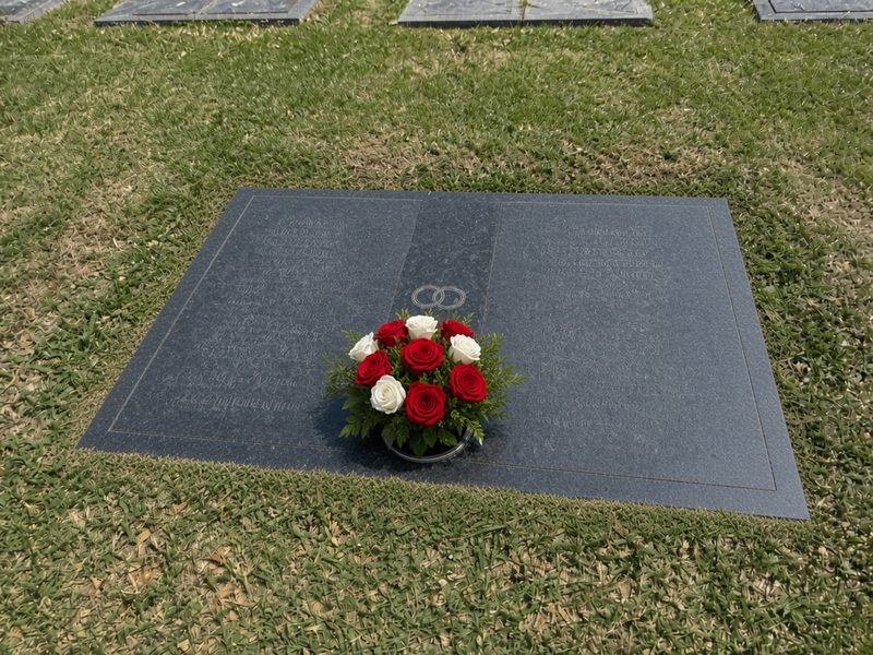 Illustrative example, after: the same companion marker cleaned and tidied, with red and white roses